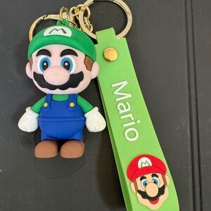MGreen Mario Keychain with Strap.nwot. Rubber. Key ring and attachment